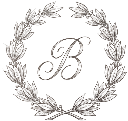 Hand-drawn laurel wreath encircling a script B