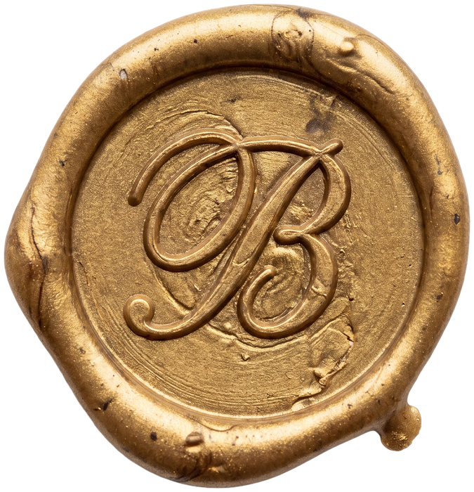 Gold wax seal embossed with a script B
